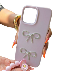IPhone 15 shiny bow conture silicone phone case