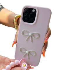 IPhone 16 shiny bow conture silicone phone case